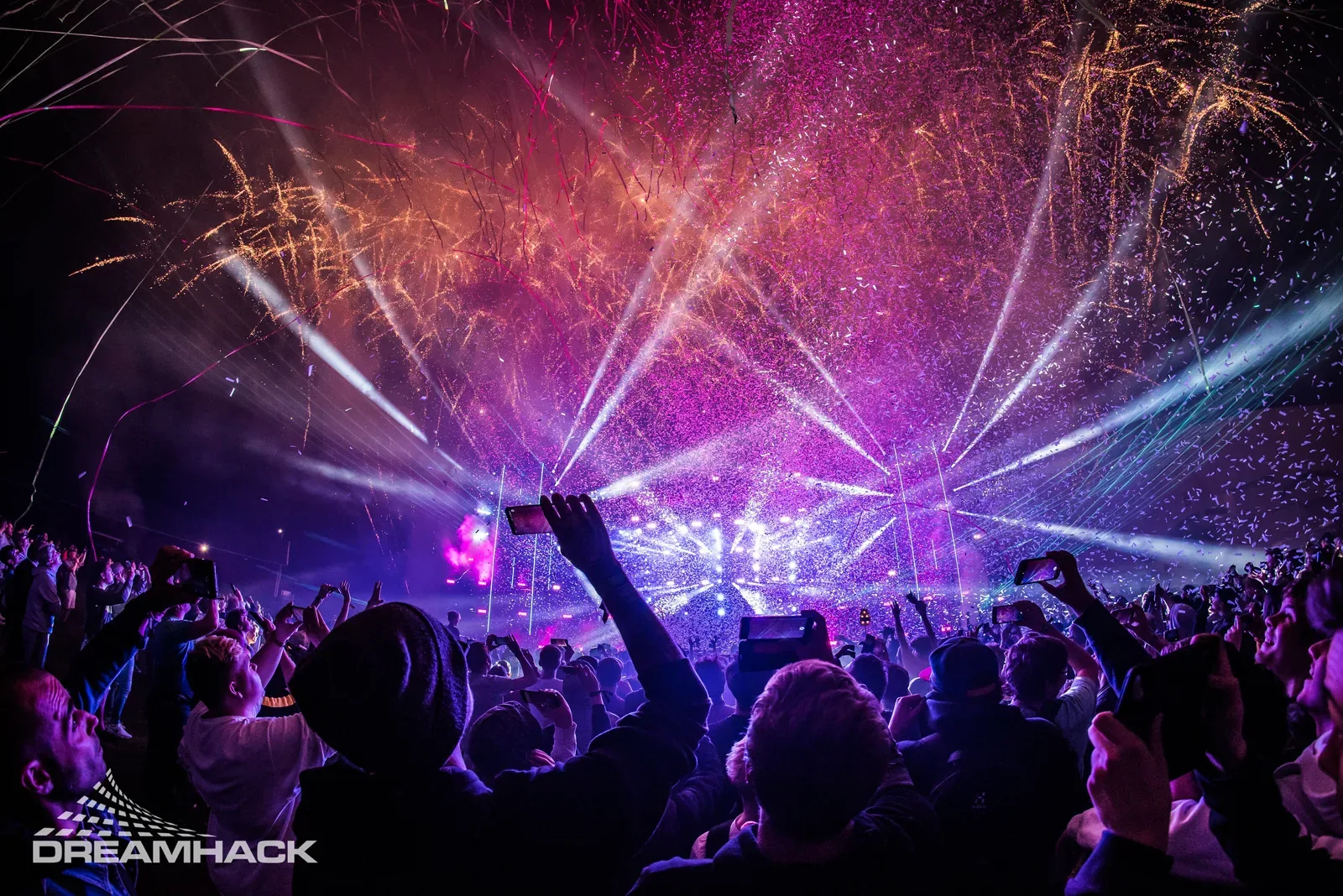DreamHack crowd under fireworks and stage lights